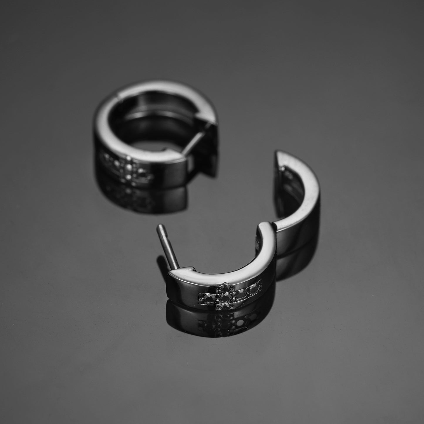 Black stones with cross hoop earrings