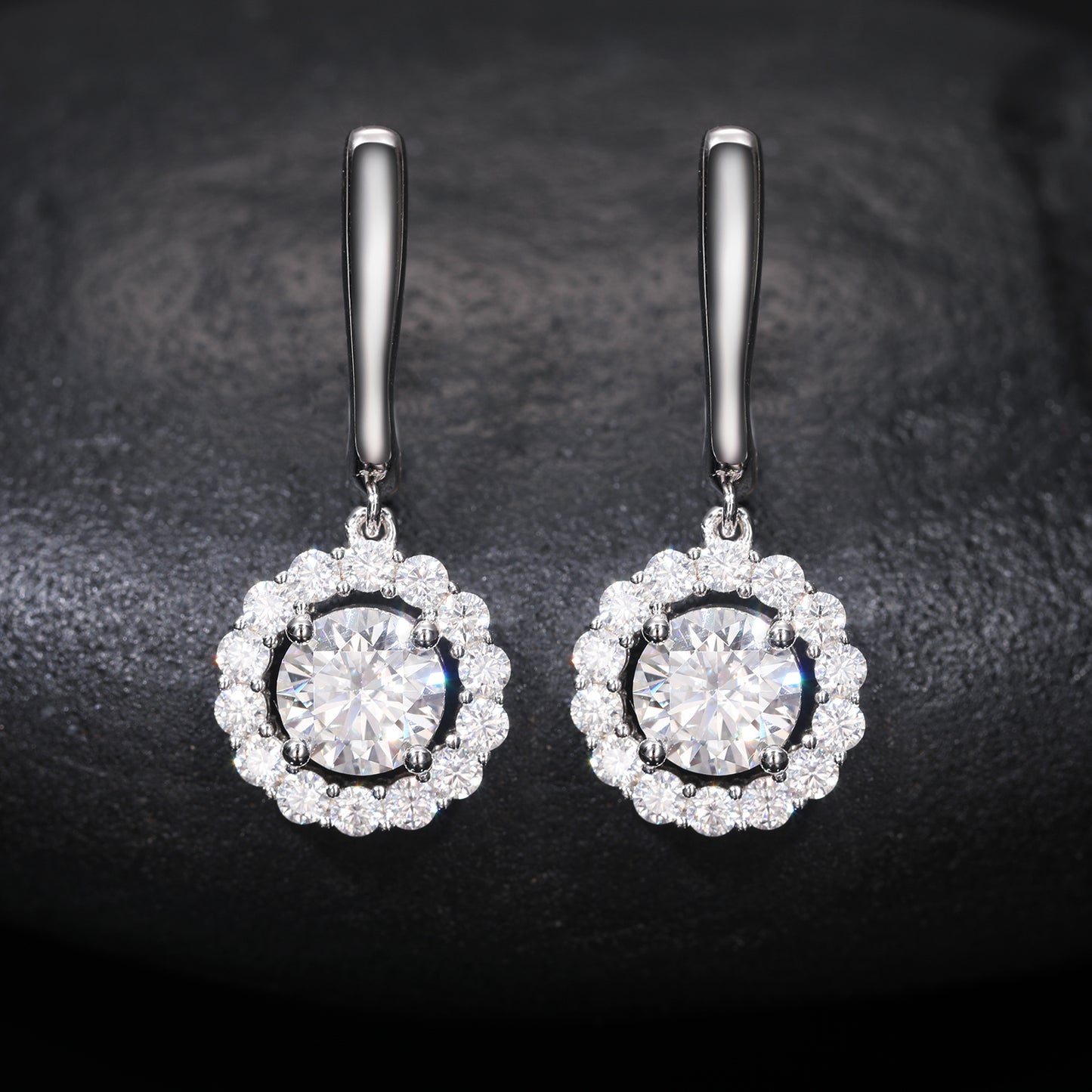 Dangling round cut earrings